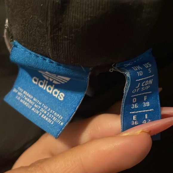 EUC Adidas black leggings w/ white symbol on the bottom of each legs - Picture 3 of 3